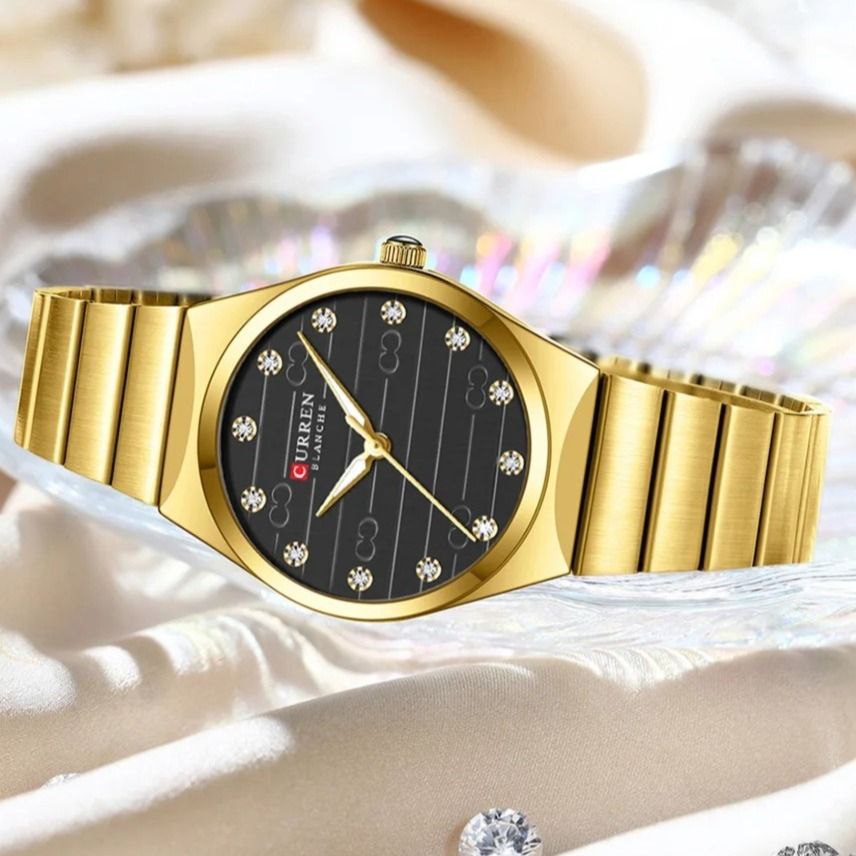 CURREN luxe minimaliste avec accents de strass et aiguilles lumineuses montres à Quartz élégantes en acier inoxydable pour femmes étanche
